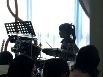 A young musician plays the drums at our Kuala Belait recital